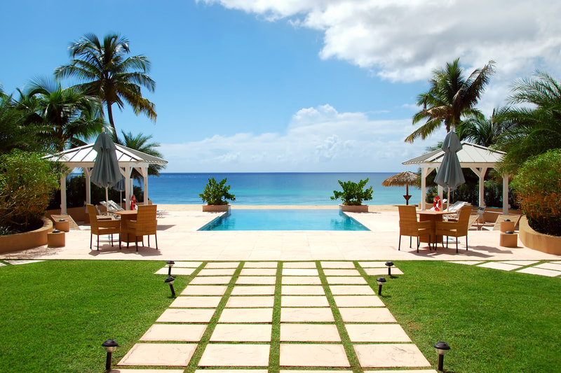 Private resort pool by the ocean